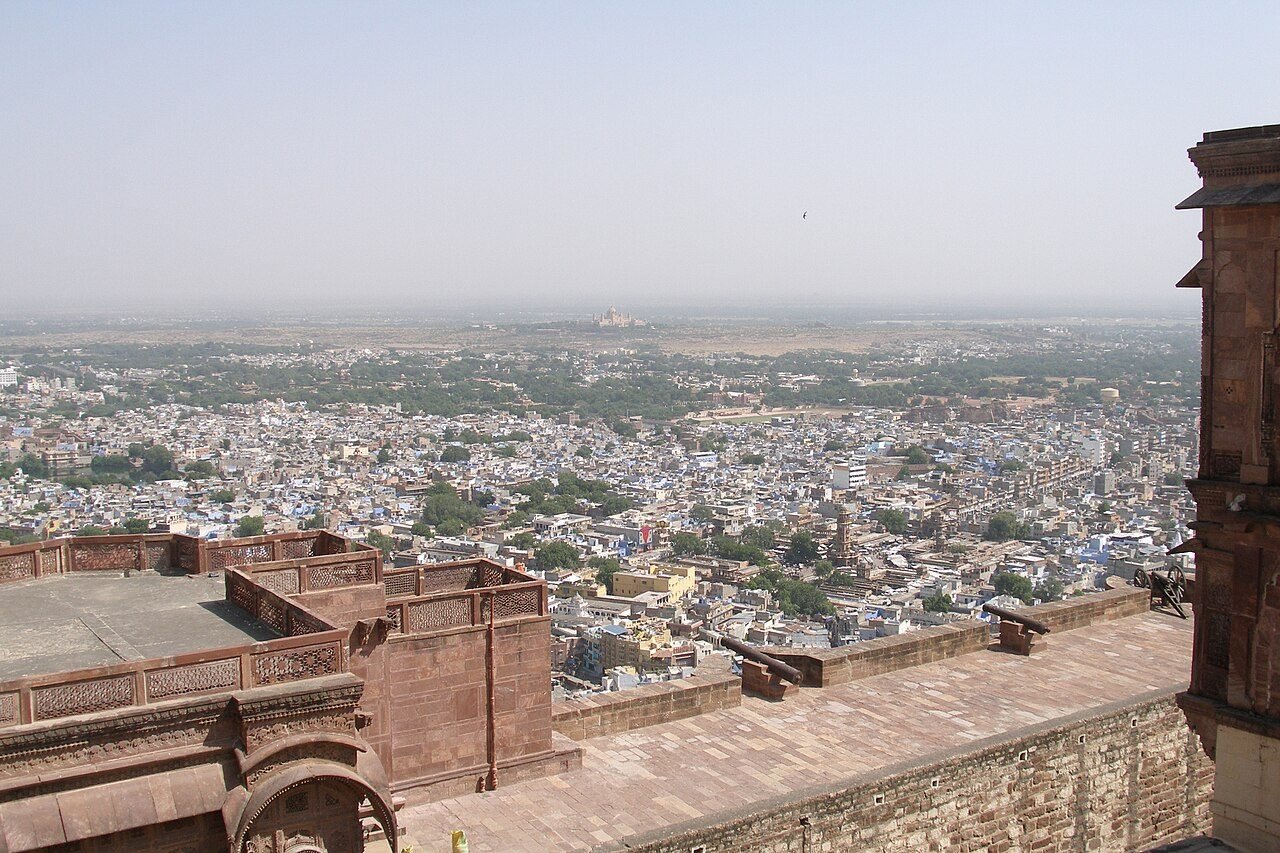 Real photograph of the Blue City of Jodhpur with Mehrangarh Fort ramparts