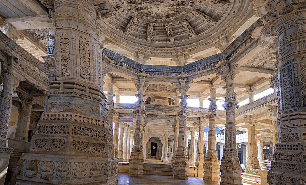 Real photograph of intricately carved marble pillars at Ranakpur Jain Temple